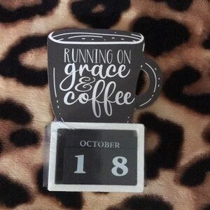 Coffee bar calandra time keeper running on grave and coffee